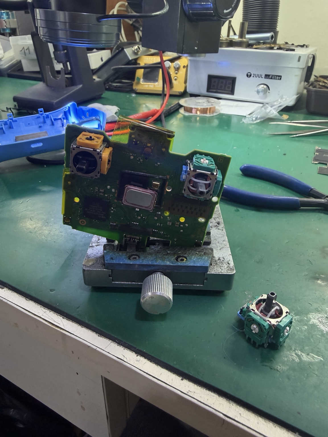 Game controller motherboard repair at the Samara Cell workbench